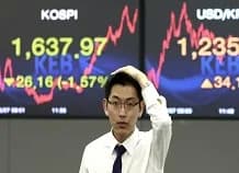Japón lideró las pérdidas en Asia mientras los inversores evalúan las actas de la reunión de la Fed